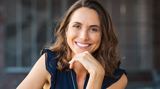 Middle aged woman with beautiful healthy skin